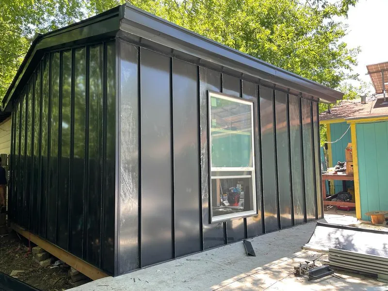 Black standing seam metal wall panels for Metal Roof Installation in Midway City