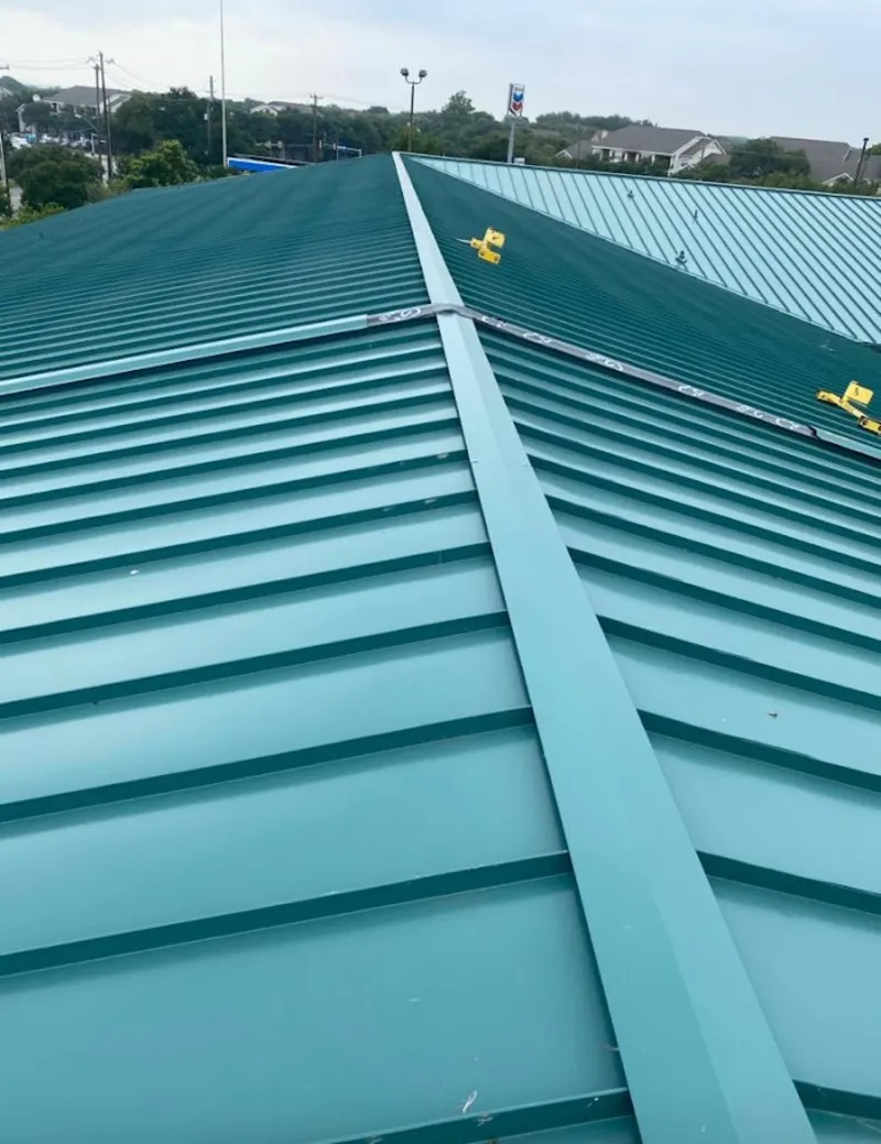 Green commercial metal roof ridge and valley for Metal Roof Repair in Midway City