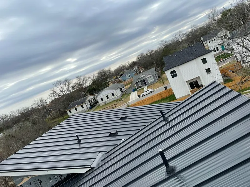 Standing seam metal roof panels with vents for Skylight Repair in Midway City